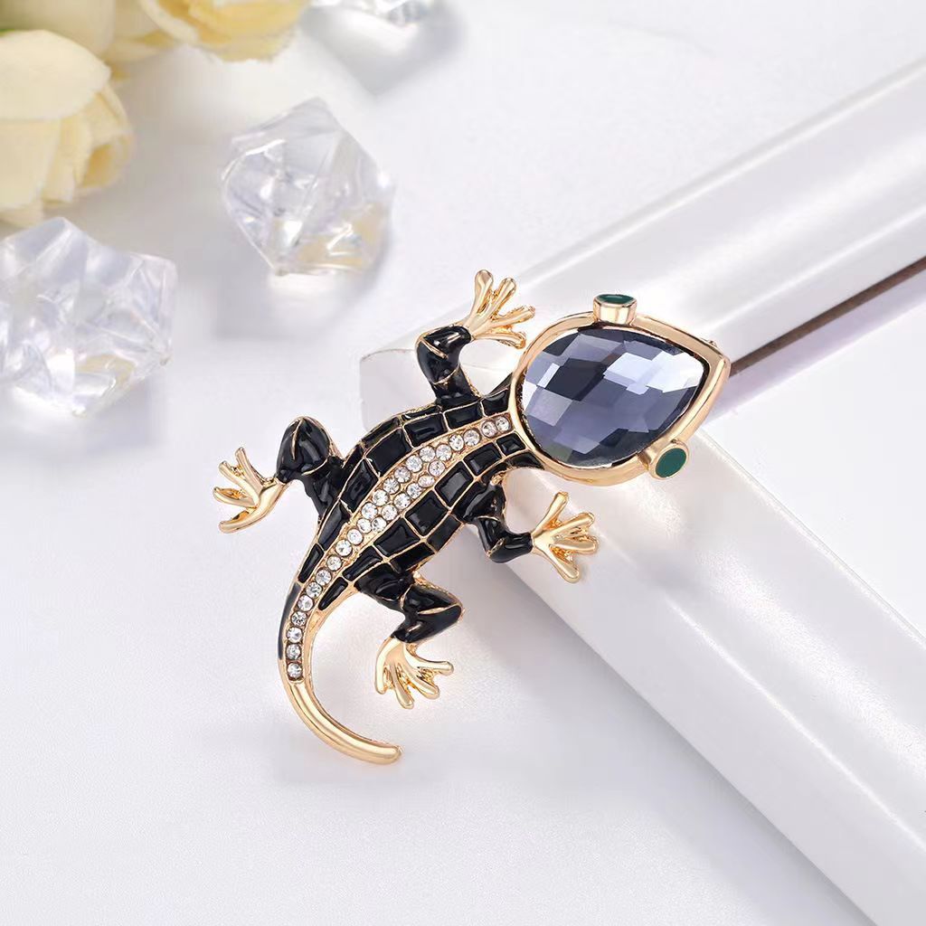 Embroidery Fish - Diamond studded glass gecko brooch, four